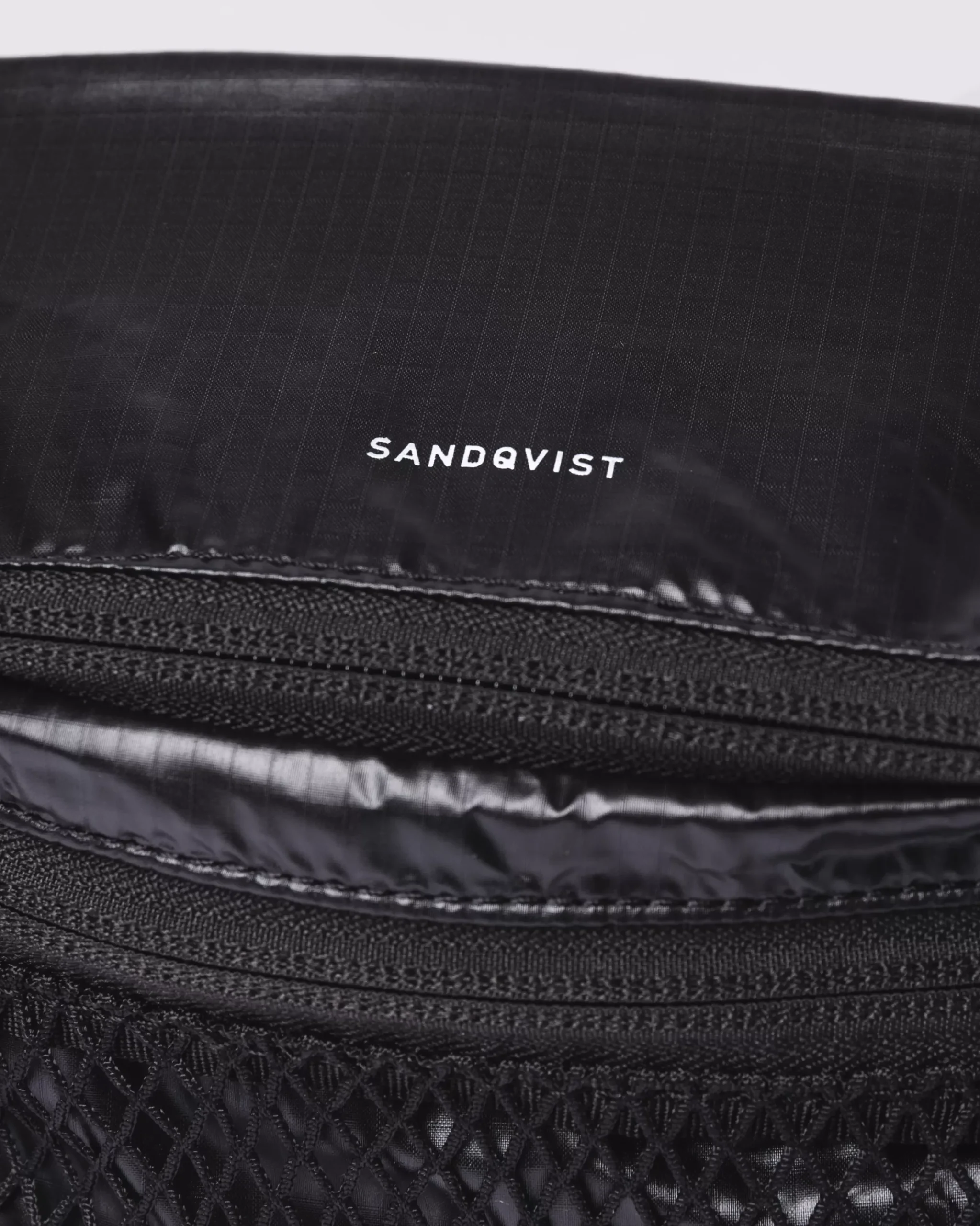 Sandqvist Lo> Magväskor